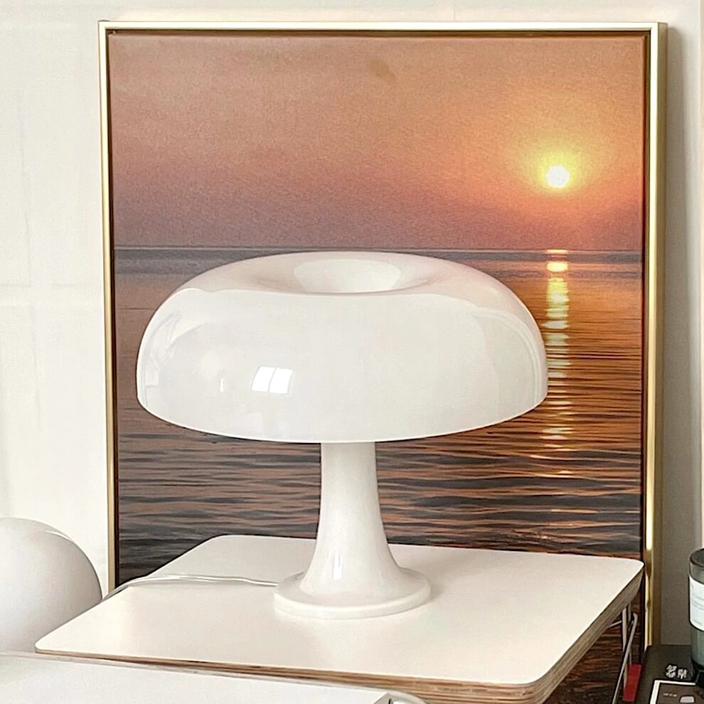 Mushroom LED table lamp on nightstand with sunset art
