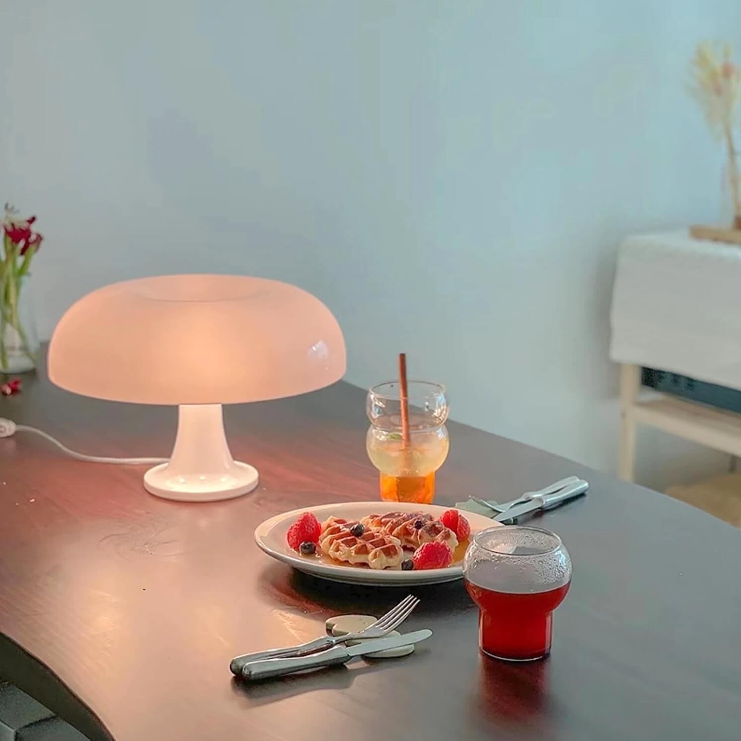 Mushroom LED table lamp illuminating room decor with breakfast