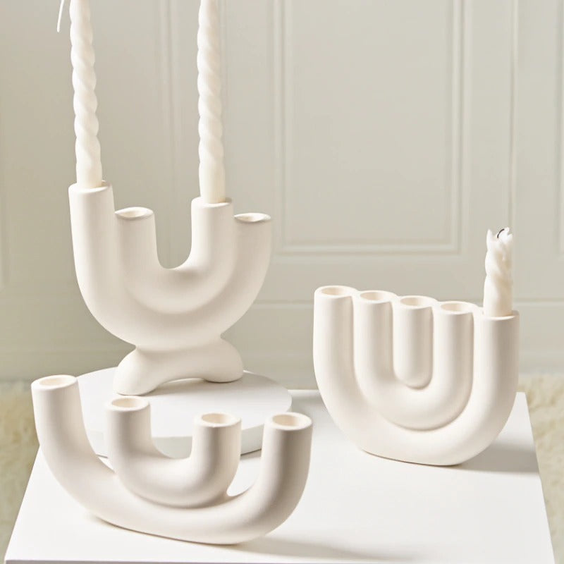 White ceramic candlestick holders