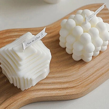 White bubble candles on wooden board - 15_736f972d