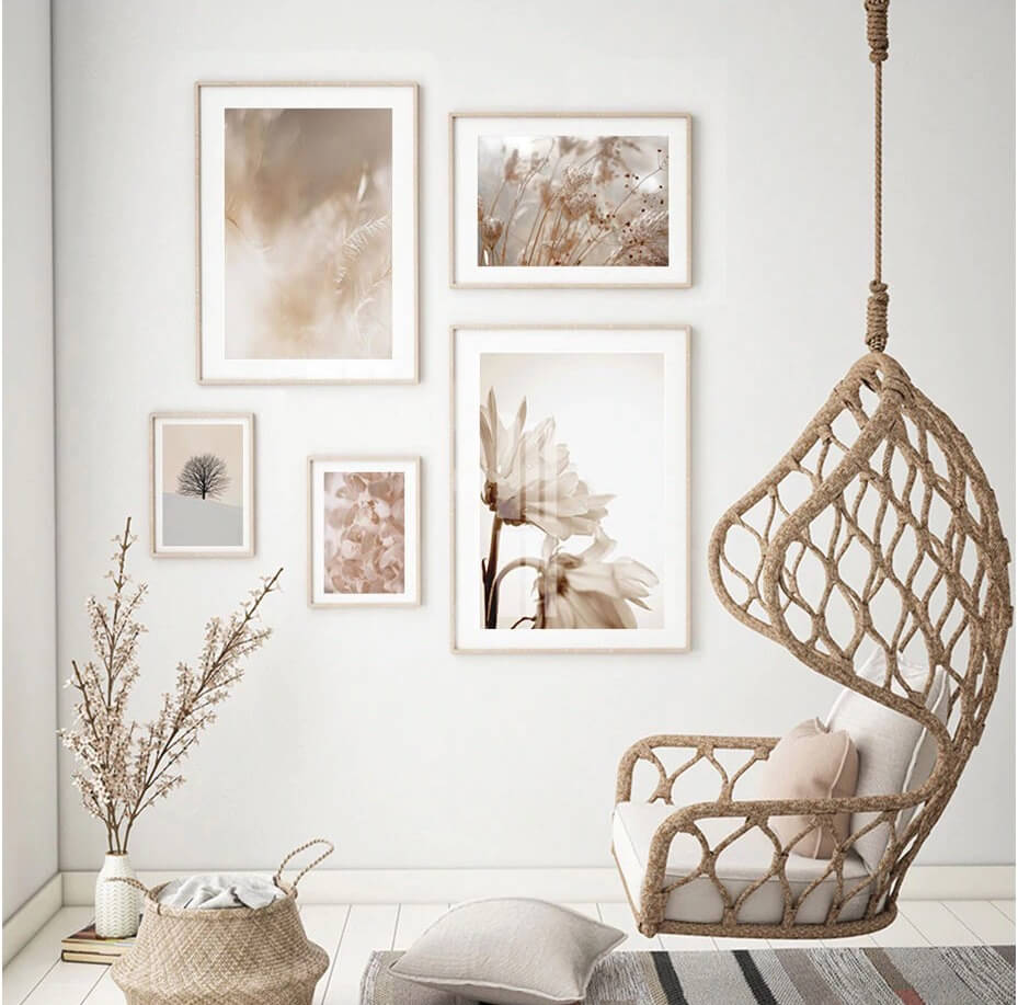 Bohemian flower petal prints gallery wall with hanging chair.