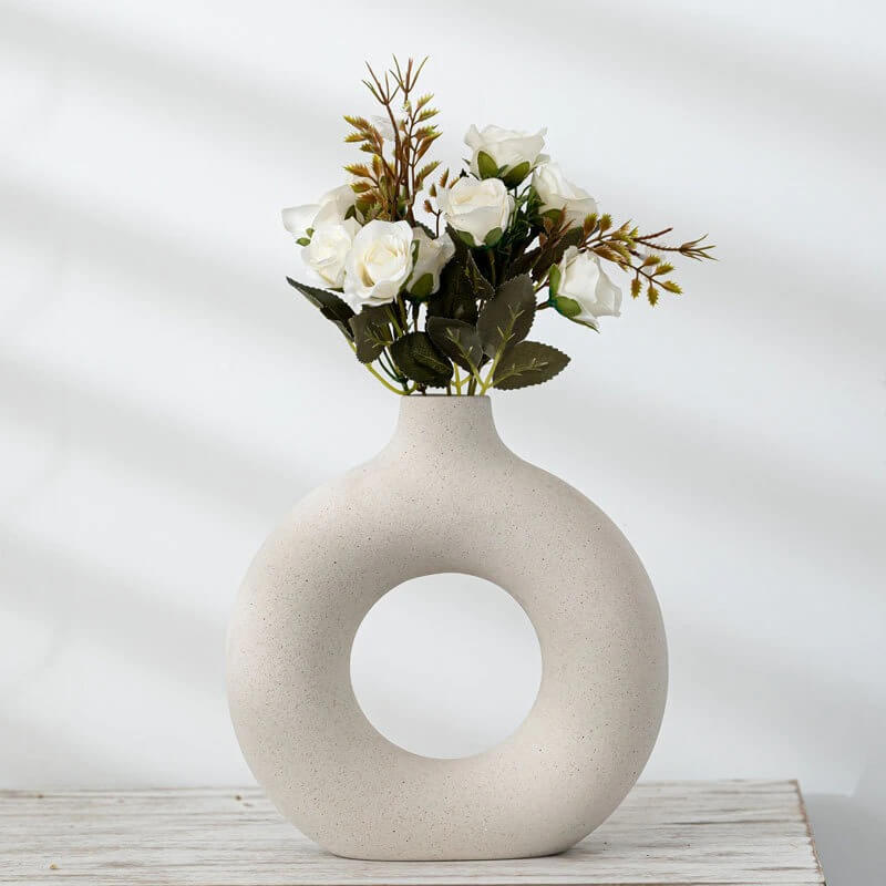 Nordic circular ceramic vase with white roses