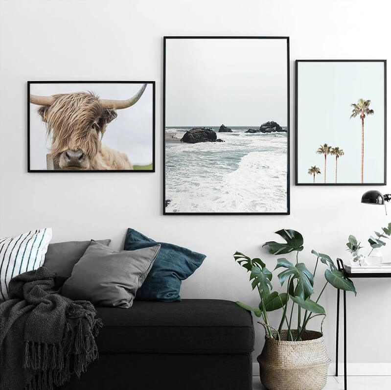 Nordic tropical coast landscape canvas art with Highland cow, palm trees, &...